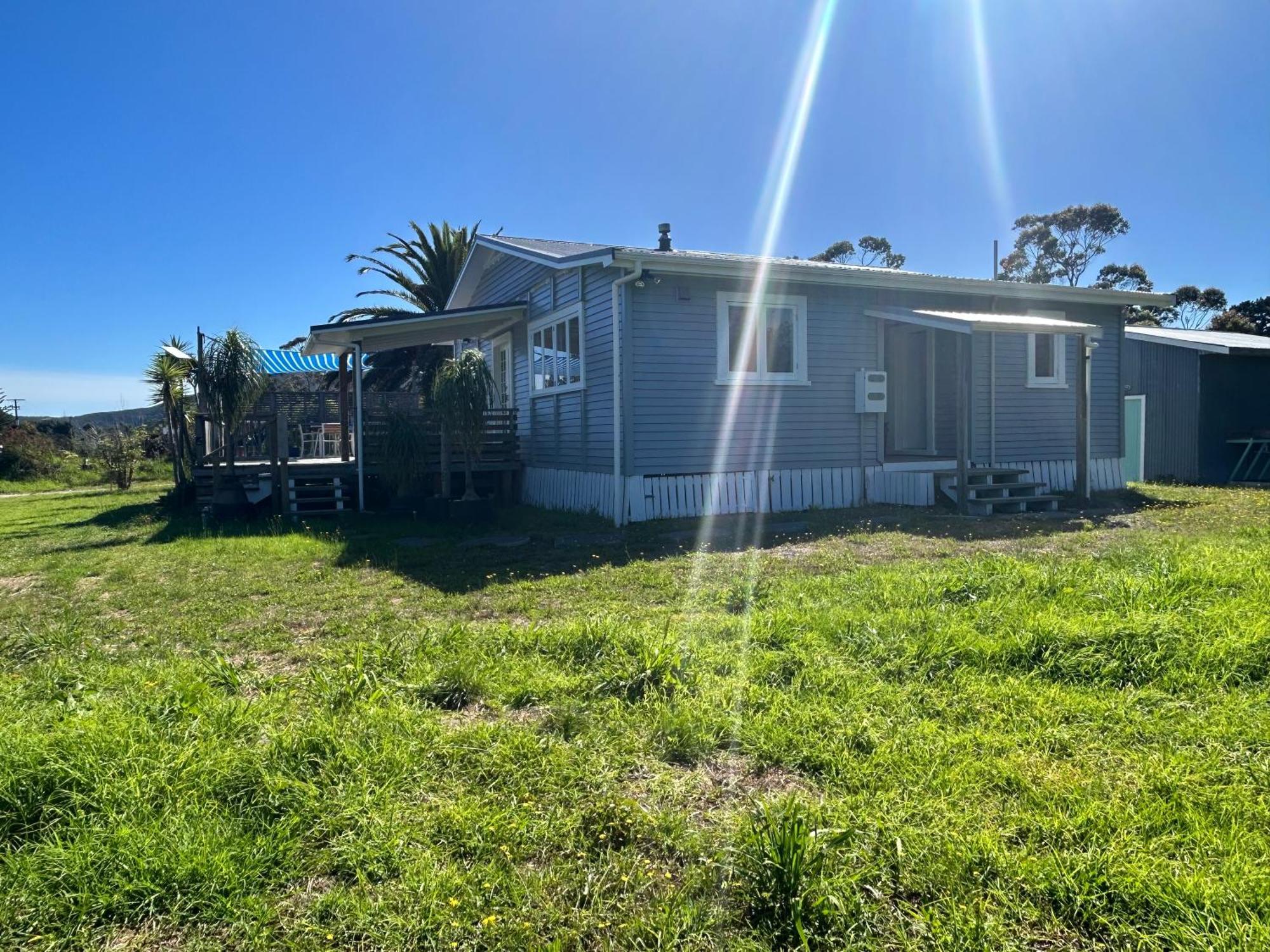 Green Turtle Cottage Pukenui Exterior photo